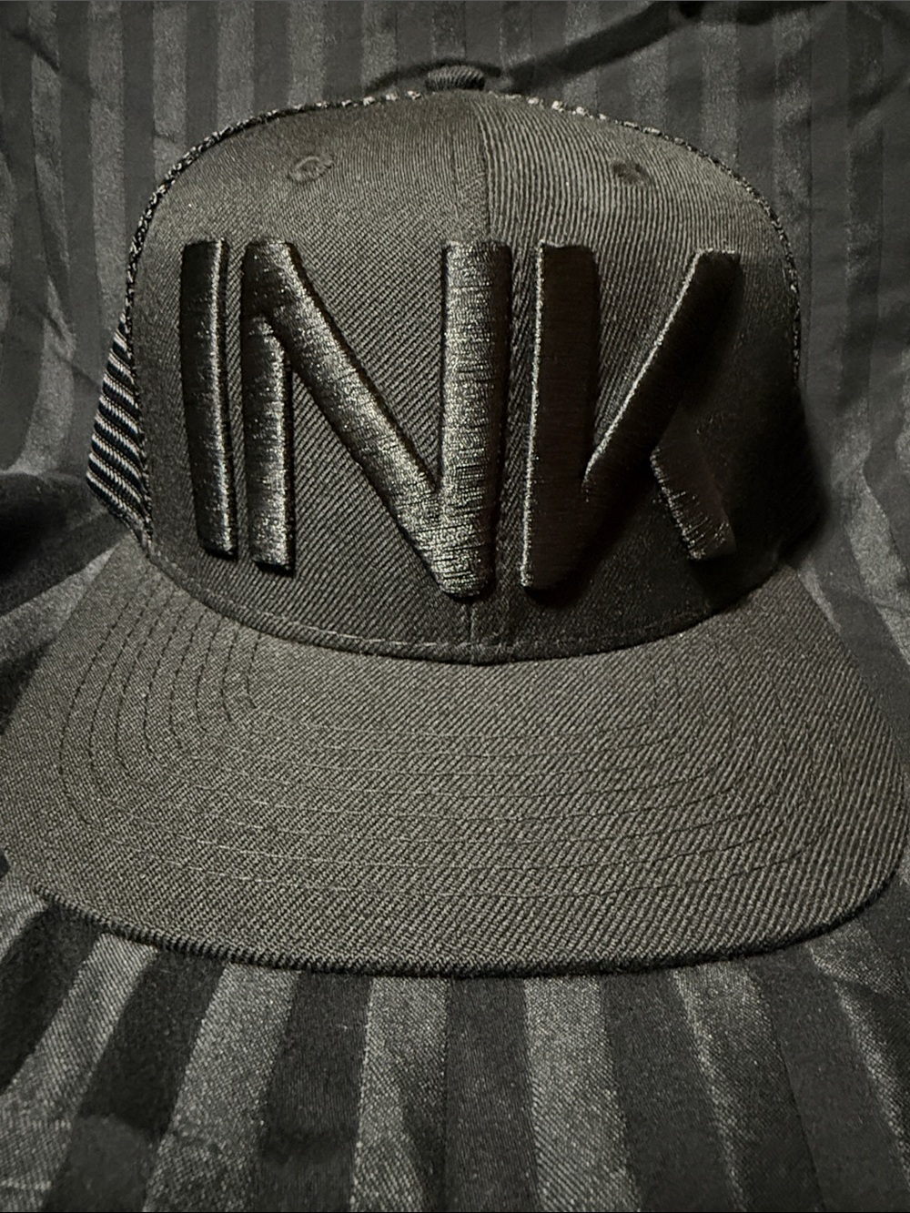 Men's Black Trucker Hat with Raised INK Embroidery